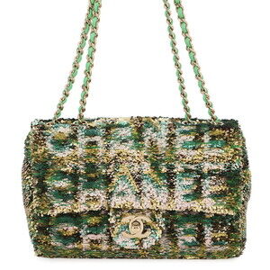 Chanel chain shoulder bag with Coco mark and sequins.
